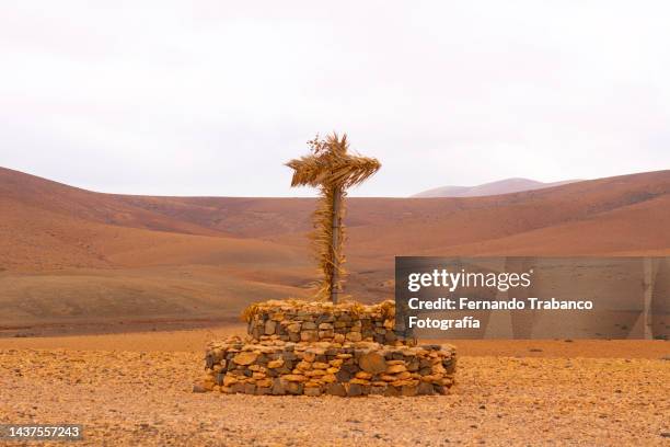 cross of palm leaves - cult stock pictures, royalty-free photos & images