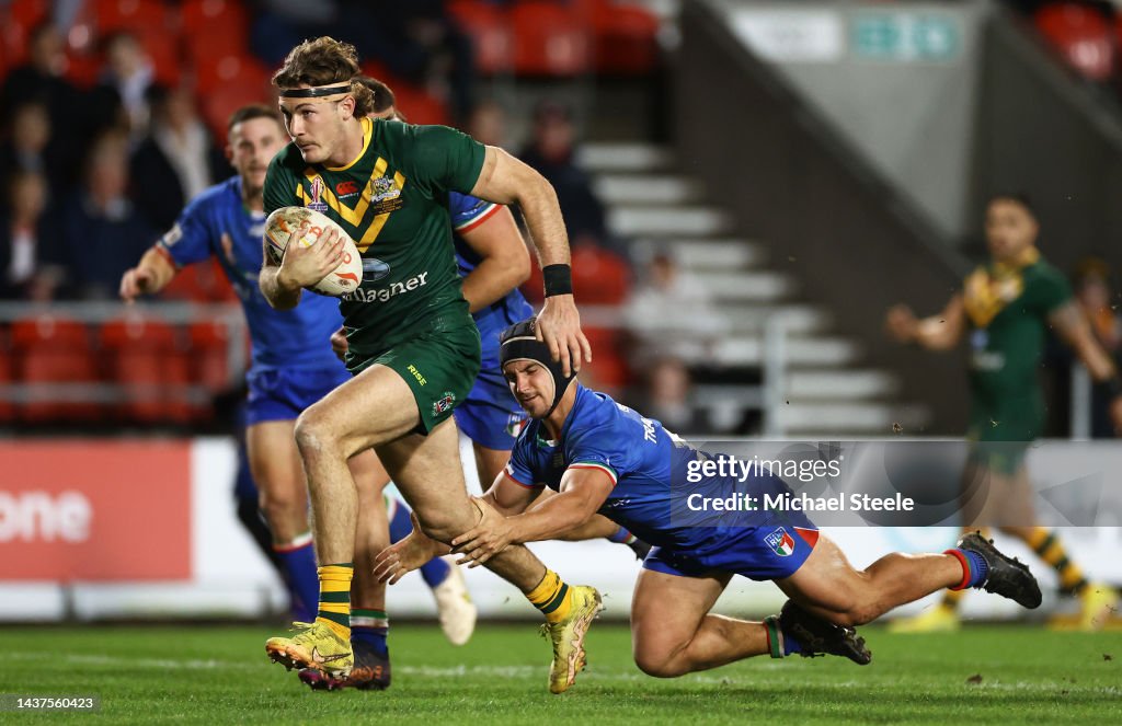 Erub Rugby Campbell Graham of Australia goes over to score their sides tenth try ...