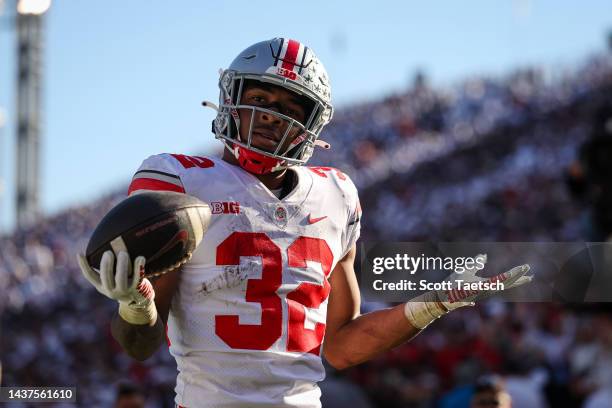 TreVeyon Henderson of the Ohio State Buckeyes reacts after scoring a touchdown against the Penn State Nittany Lions during the second half at Beaver...