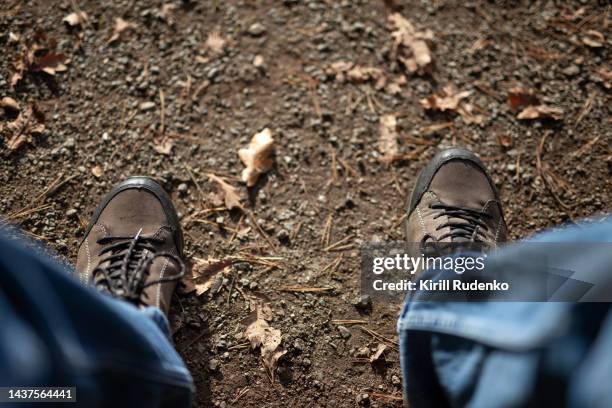 hiker's feet photographed in a pov - pov shoes スト��ックフォトと画像