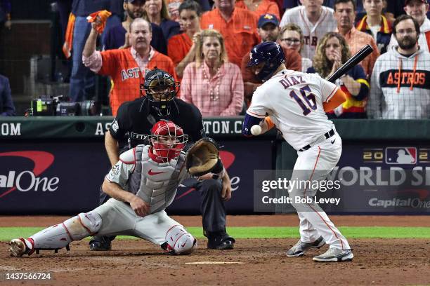 Aledmys Diaz of the Houston Astros is hit by a pitch during the tenth inning in Game One of the 2022 World Series at Minute Maid Park on October 28,...