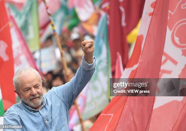 Former president of Brazil and presidential candidate Luiz Inacio Lula da Silva greets supporters during his last rally before the election on...