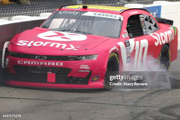 Landon Cassill, driver of the StormX Chevrolet, spins into the wall after an on-track incident during the NASCAR Xfinity Series Dead On Tools 250 at...