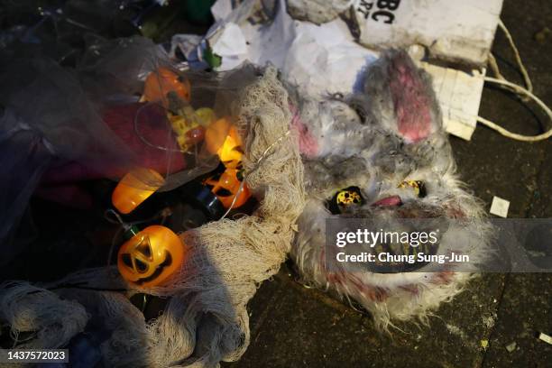 The belongings of victims are seen at the scene of a deadly stampede during a Halloween festival on October 30, 2022 in Seoul, South Korea. 146...