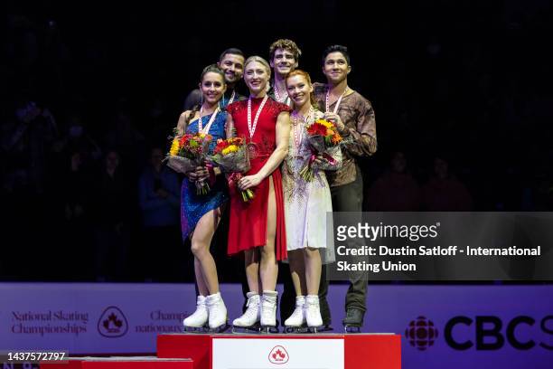 Lilah Fear and Lewis Gibson of Great Britain, Piper Gilles and Paul Poirier of Canada, and Marjorie Lajoie and Zachary Lagha of Canada on the podium...
