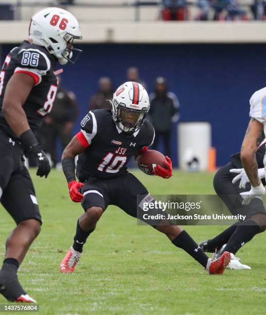 Receiver Willie Gaines looks for an open lane after catching a screen pass during the Jackson State Tigers and Southern University Jaguars NCAA...