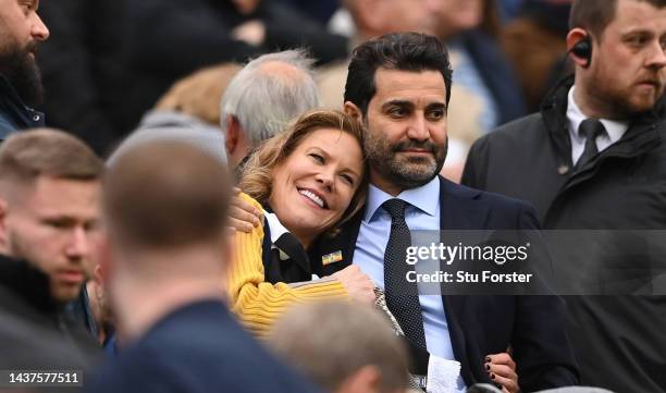 Newcastle United co-owners Amanda Staveley and husband Mehrdad Ghodoussi embrace as their Wedding anniversary is displayed on the big screen during...