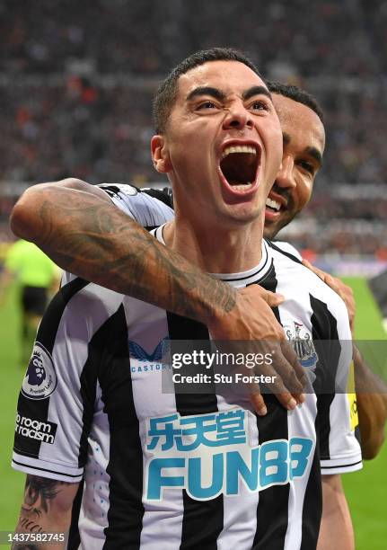 Goalscorer Miguel Almiron celebrates after scoring the fourth Newcastle goal with Callum Wilson during the Premier League match between Newcastle...