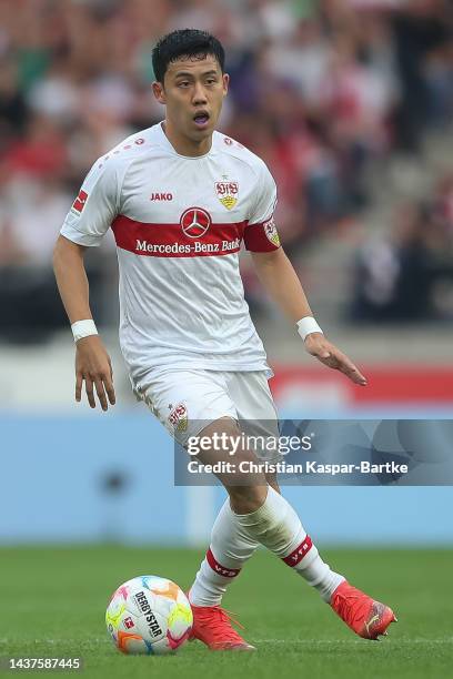 Wataru Endo of VfB Stuttgart in action during the Bundesliga match between VfB Stuttgart and FC Augsburg at Mercedes-Benz Arena on October 29, 2022...