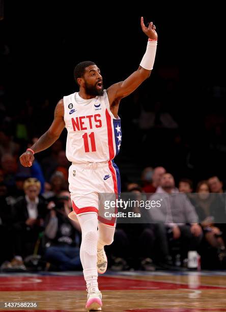 Kyrie Irving of the Brooklyn Nets directs his teammates in the second quarter against the Indiana Pacers at Barclays Center on October 29, 2022 in...