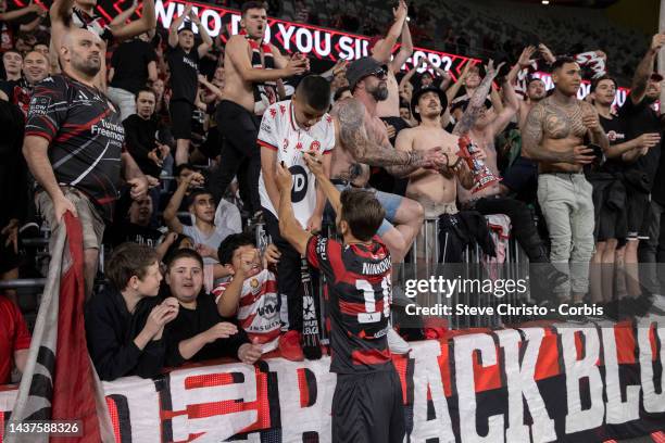 Milos Ninkovic of the Wanderers celebrates with fans at full time during the round four A-League Men's match between Western Sydney Wanderers and...