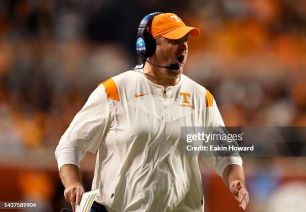 Head coach Josh Heupel of the Tennessee Volunteers runs down the sideline in the first quarter of the game against the Kentucky Wildcats at Neyland...