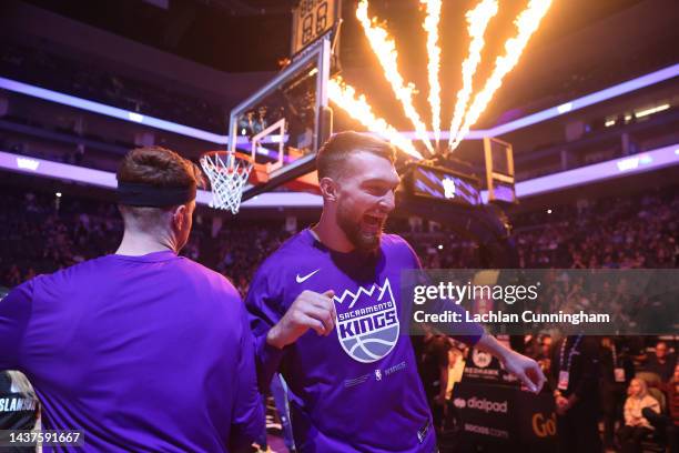 Domantas Sabonis and Kevin Huerter of the Sacramento Kings during player introductions before the game against the Miami Heat at Golden 1 Center on...