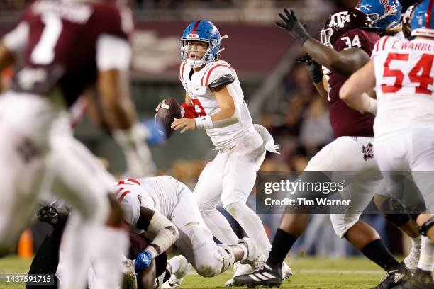 Jaxson Dart of the Mississippi Rebels looks to pass in the first half of the game \at at Kyle Field on October 29, 2022 in College Station, Texas.