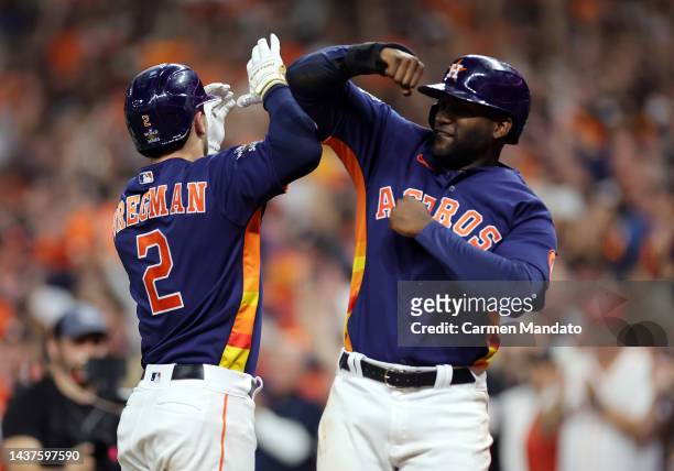 Alex Bregman and Yordan Alvarez of the Houston Astros celebrates a two run home run in the fifth inning against the Philadelphia Phillies in Game Two...
