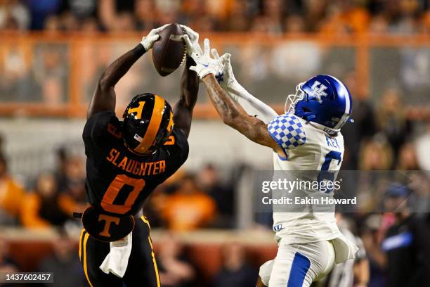 Doneiko Slaughter of the Tennessee Volunteers intercepts a pass intended for Dane Key of the Kentucky Wildcats in the third quarter of the game at...