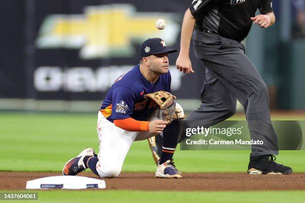 Jose Altuve of the Houston Astros reacts after an error in the eighth inning against the Philadelphia Phillies in Game Two of the 2022 World Series...