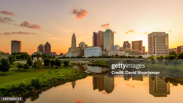 a high-level view of downtown columbus ohio and scioto mile park at sunrise,  columbus, oh - usa - columbus ohio ストックフォトと画像