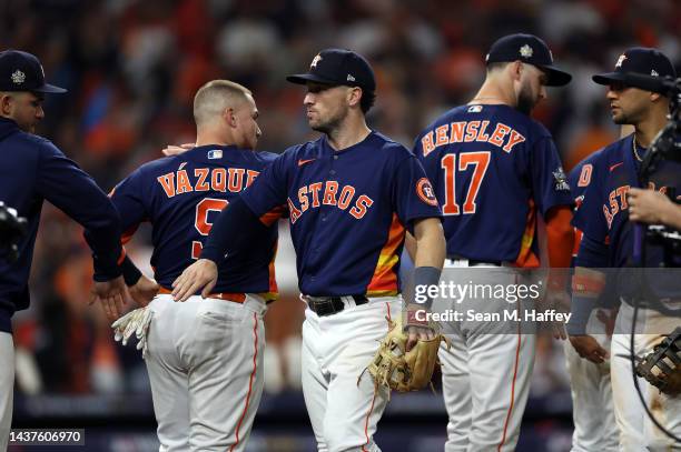 Alex Bregman of the Houston Astros celebrates with teammates after a win over the Philadelphia Phillies in Game Two of the 2022 World Series at...