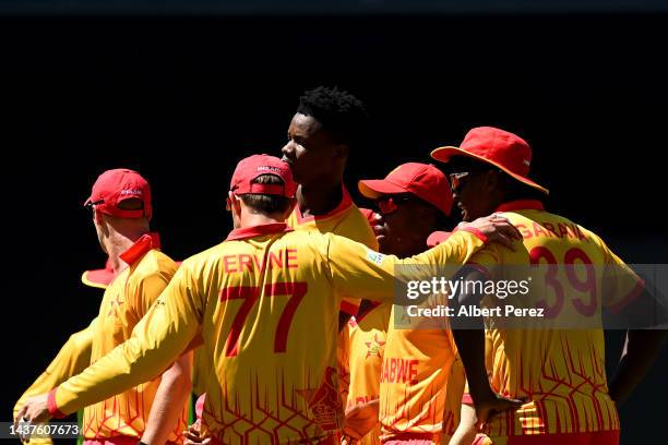 Zimbabwe celebrate the wicket of Litton Das of Bangladesh during the ICC Men's T20 World Cup match between Bangladesh and Zimbabwe at The Gabba on...