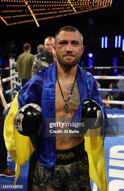 Vasiliy Lomachenko poses after his unanimous decision win against Jamaine Ortiz after their lightweight bout at The Hulu Theater at Madison Square...