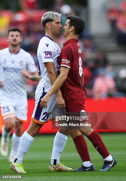 Giordana Colli of Perth Glory faces off with Isaias Sanchez of Adelaide United during the round four A-League Men's match between Adelaide United and...