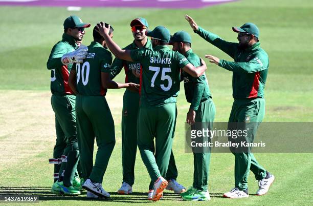 Afif Hossain and Mustafizur Rahman of Bangladesh celebrates taking the wicket of Sikandar Raza of Zimbabwe during the ICC Men's T20 World Cup match...