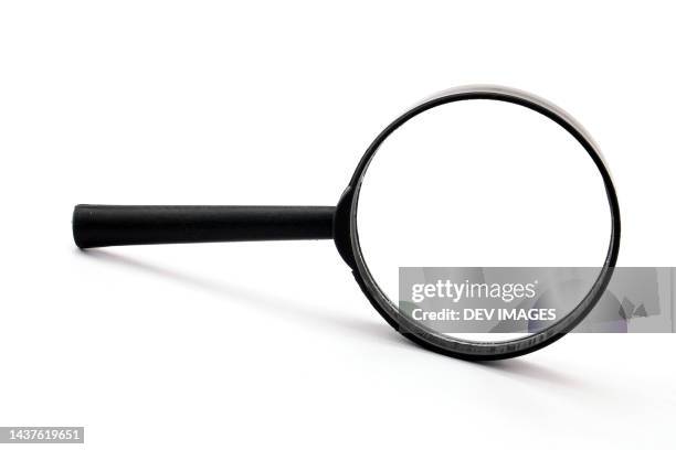 magnifying glass isolated on white background - loupe stock-fotos und bilder