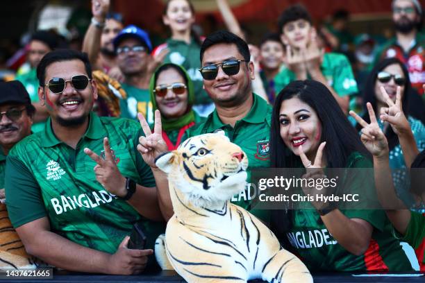 Bangladesh fans cheer during the ICC Men's T20 World Cup match between Bangladesh and Zimbabwe at The Gabba on October 30, 2022 in Brisbane,...