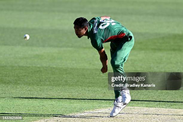 Mustafizur Rahman of Bangladesh bowls during the ICC Men's T20 World Cup match between Bangladesh and Zimbabwe at The Gabba on October 30, 2022 in...