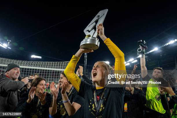 Bella Bixby of the Portland Thorns celebrates with the NWSL trophy after a NWSL Cup Final game between Kansas City Current and Portland Thorns FC at...