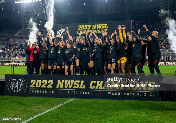 The Portland Thorns raise the NWSL trophy after a NWSL Cup Final game between Kansas City Current and Portland Thorns FC at Audi Field on October 29,...