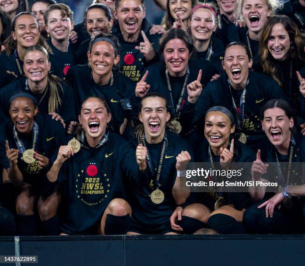 The Portland Thorns celebrates with the NWSL trophy after a NWSL Cup Final game between Kansas City Current and Portland Thorns FC at Audi Field on...