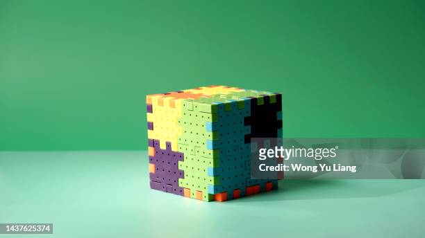cube colored puzzle, business solutions concept - teaser stock-fotos und bilder