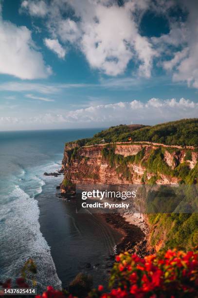 cliff at uluwatu temple, bali, indonesia - uluwatu stock pictures, royalty-free photos & images