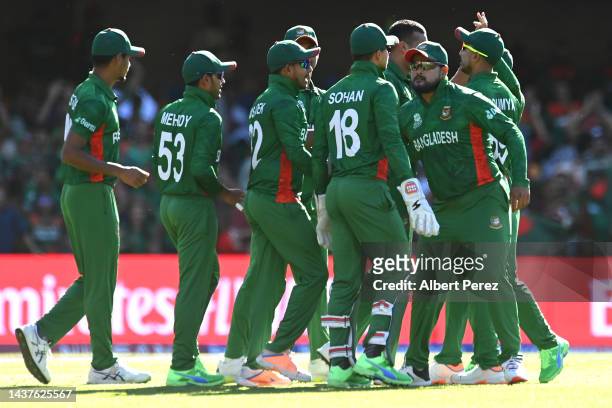 Bangladesh celebrate a wicket during the ICC Men's T20 World Cup match between Bangladesh and Zimbabwe at The Gabba on October 30, 2022 in Brisbane,...