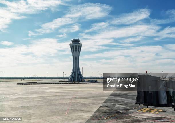 airport tower - advertising background - torre di controllo foto e immagini stock