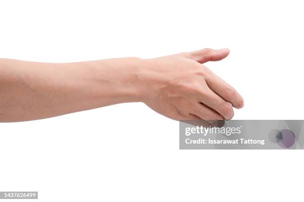 woman's hand outstretched in a helping hand, caring gesture. isolated on white. - reaching fotografías e imágenes de stock