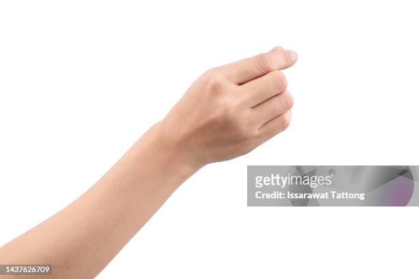 female hand holding a virtual card with your fingers on a white background - hand in hand stock-fotos und bilder