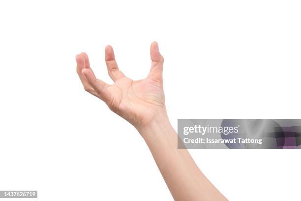 a hand holding something like a bottle or smartphone on white background, hand isolated on white background - palm of hand stock pictures, royalty-free photos & images