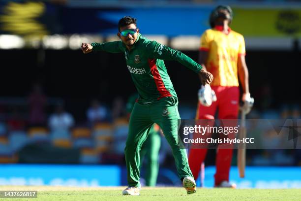 Mosaddek Hossain of Bangladesh celebrates winning the ICC Men's T20 World Cup match between Bangladesh and Zimbabwe at The Gabba on October 30, 2022...