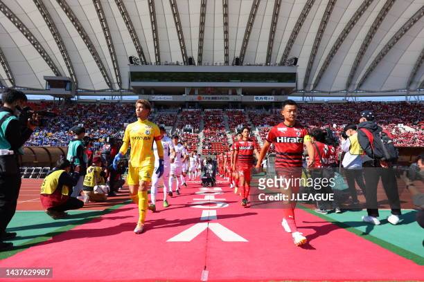 Players walk into the pitch prior to the J.LEAGUE J.LEAGUE J1/J2 Playoff first round between Roasso Kumamoto and Oita Trinita at Egao Kenko Stadium...