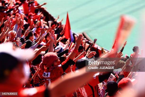 Supporters cheer with keeping social distances the J.LEAGUE J.LEAGUE J1/J2 Playoff first round between Roasso Kumamoto and Oita Trinita at Egao Kenko...