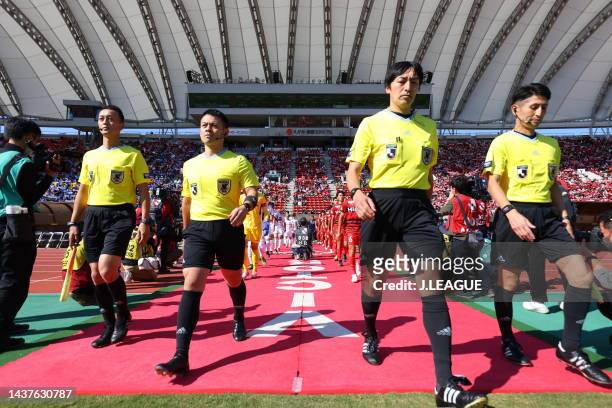 Referee　walk into the pitch prior to the J.LEAGUE J.LEAGUE J1/J2 Playoff first round between Roasso Kumamoto and Oita Trinita at Egao Kenko Stadium...
