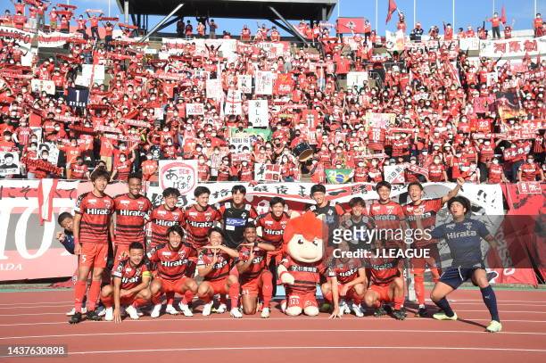 Roasso Kumamoto players line up for the team photos prior to during the J.LEAGUE J.LEAGUE J1/J2 Playoff first round between Roasso Kumamoto and Oita...