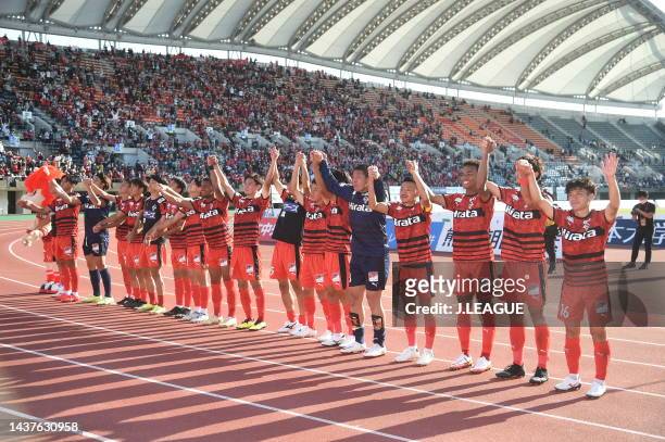 Roasso Kumamoto players applaud fans after their 2-2 victory in during the J.LEAGUE J.LEAGUE J1/J2 Playoff first round between Roasso Kumamoto and...