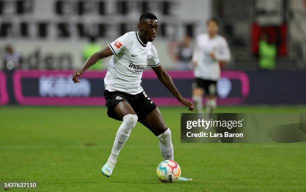 Randal Kolo Muani of Frankfurt runs with the ball during the Bundesliga match between Eintracht Frankfurt and Borussia Dortmund at Deutsche Bank Park...