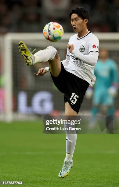 Daichi Kamada of Frankfurt runs with the ball during the Bundesliga match between Eintracht Frankfurt and Borussia Dortmund at Deutsche Bank Park on...