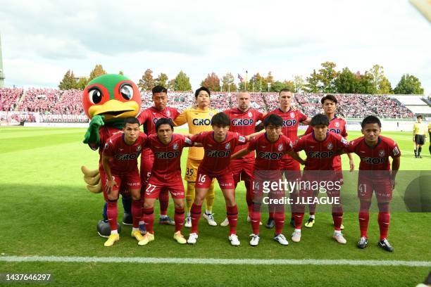 Fagiano Okayama players line up for the team photos prior to the J.LEAGUE J.LEAGUE J1/J2 Playoff first round between Fagiano Okayama and Montedio...