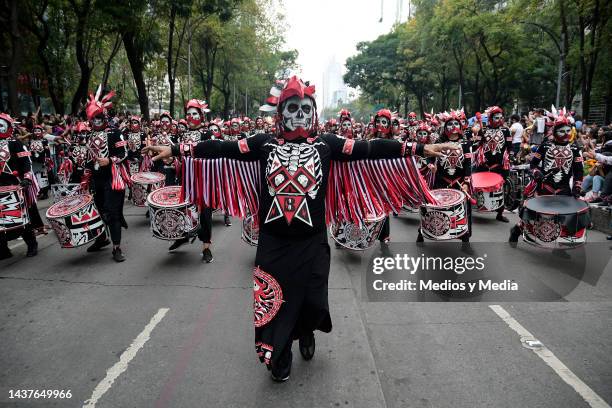 Carnival of people dressed as typical characters of Mexican culture parade through through during the 'Day of The Dead Festival' at Paseo de la...
